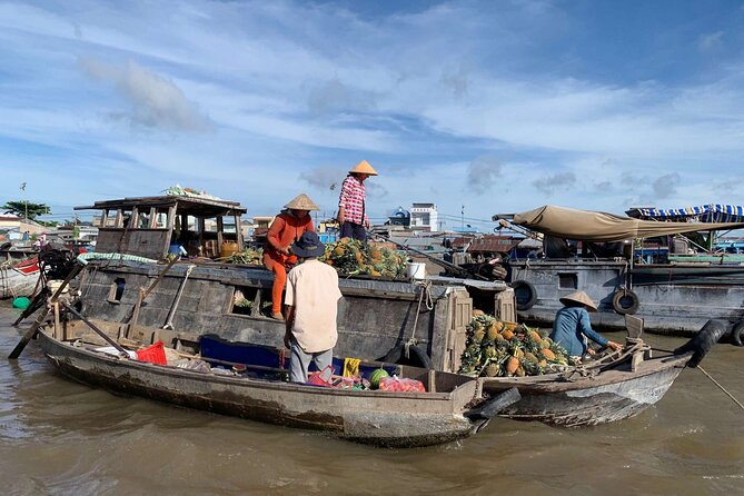 1-Day Cai Rang Floating Market-Biking & Cu Chi Tunnel Trip - Biking through rice paddies and village waterways
