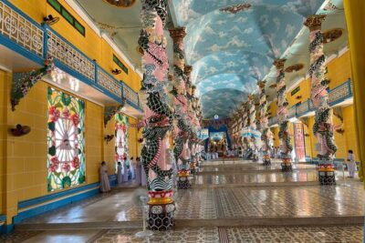 1-Day Tay Ninh– Cao Dai Temple & Cu Chi Tunnels Tour - Cao Dai Temple in Tay Ninh: architecture, religion, and midday prayer