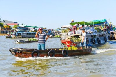 3-day group tour from Saigon to Phnom Penh - Day 1: Vinh Trang, Ben Tre orchards, then Can Tho market time