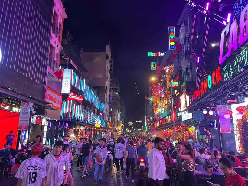 Free E-sim Saigon Nightlife Hopping Tour - Meeting point at Vincom Center Đồng Khởi: easy start, clear handoff