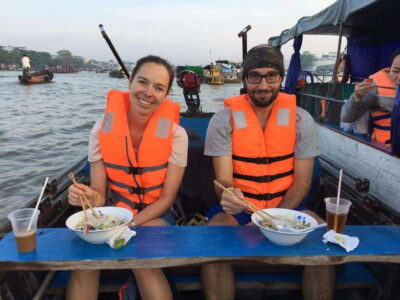 From HCM 1-day Cai Rang floating market local mekong village - Floating market breakfast: coffee, coconut, and boat trading