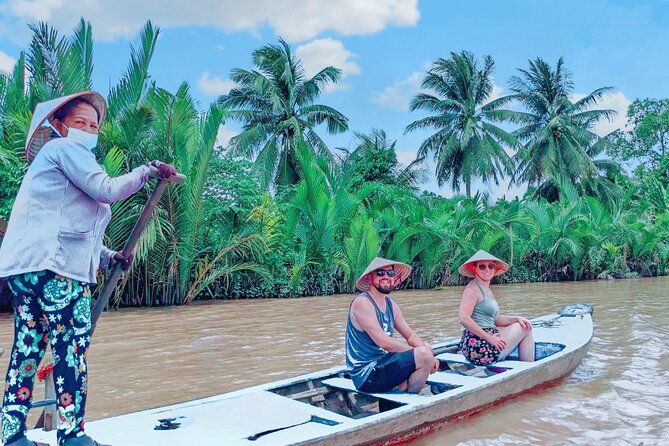 From HCM City: Mekong Delta Tour with Sampan Journey - Sampan ride through coconut-lined canals: the quiet highlight