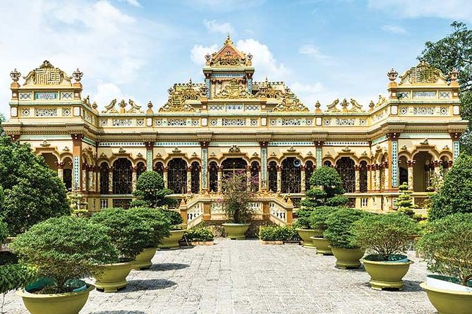 From HCM City: Mekong Delta Tour with Sampan Journey - Unicorn Islet: fruit, honey tea, folk music, and village walking