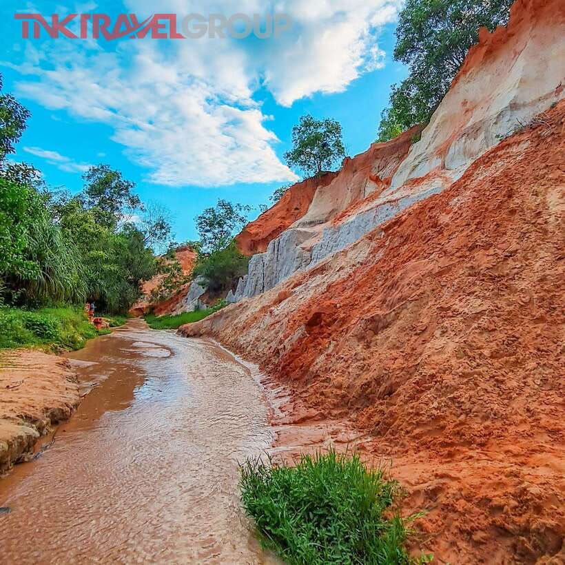 From Ho Chi Minh: Mui Ne Sand Dunes and Beach Day Tour - Fairy Stream walk: color, rock formations, and a calmer finish