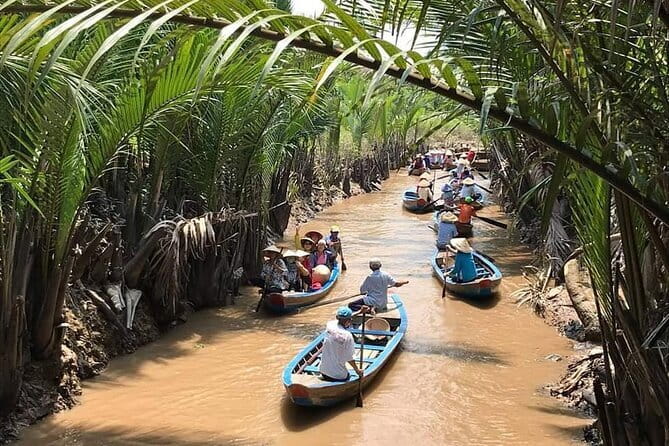Full day Cu Chi Tunnels and Mekong Delta - Coconut candy, honey farm, and honey tea (with local music)
