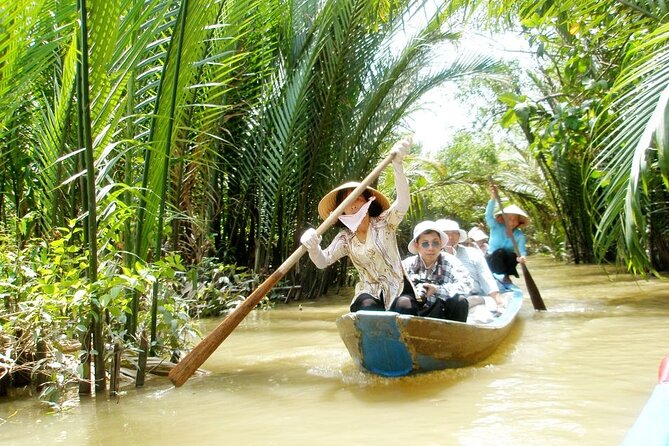 Ho Chi Minh: Best Seller of Cu Chi Tunnel & Mekong Delta Cruise - Mekong Delta by Boat: Coconut Trees, Canals, and Real Daily Life