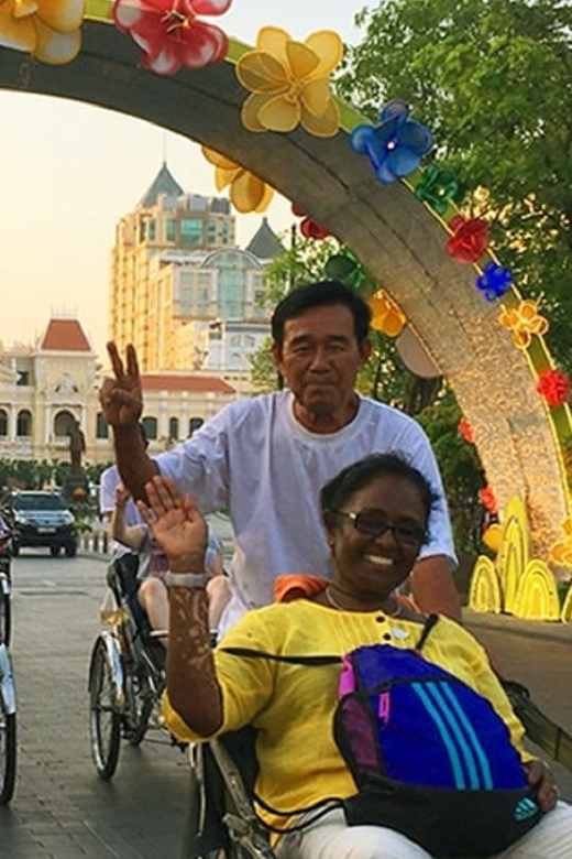 Ho Chi Minh City Cyclo Tour with English Speaking Guide - Nguyen Hue Street, Saigon River Views, and Bitexco on the Move