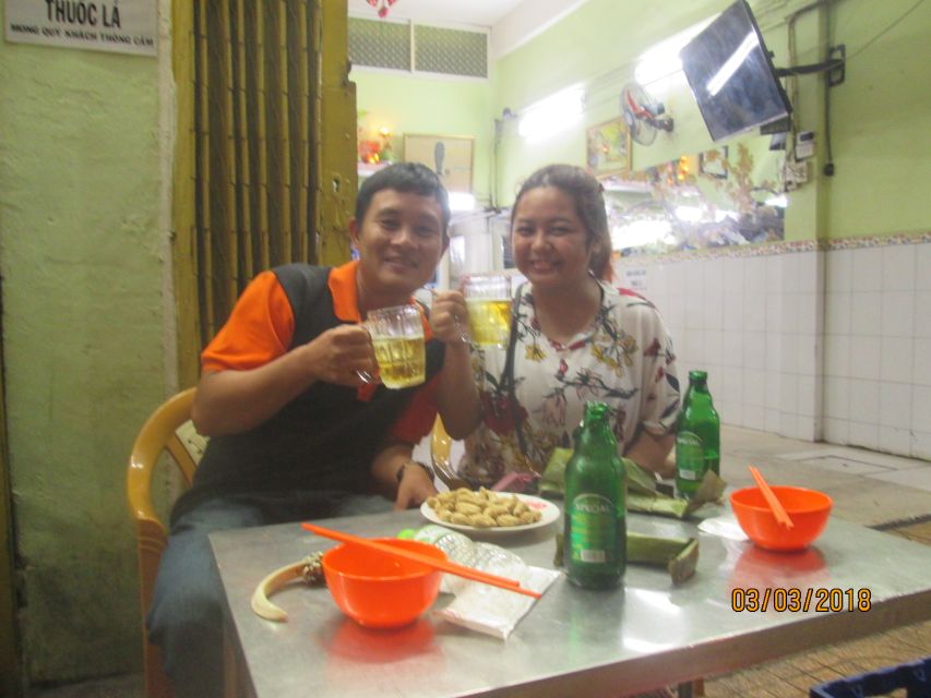 Ho Chi Minh City: Midnight Motorbike Tour - Floating market fruit stops and the sweetness break