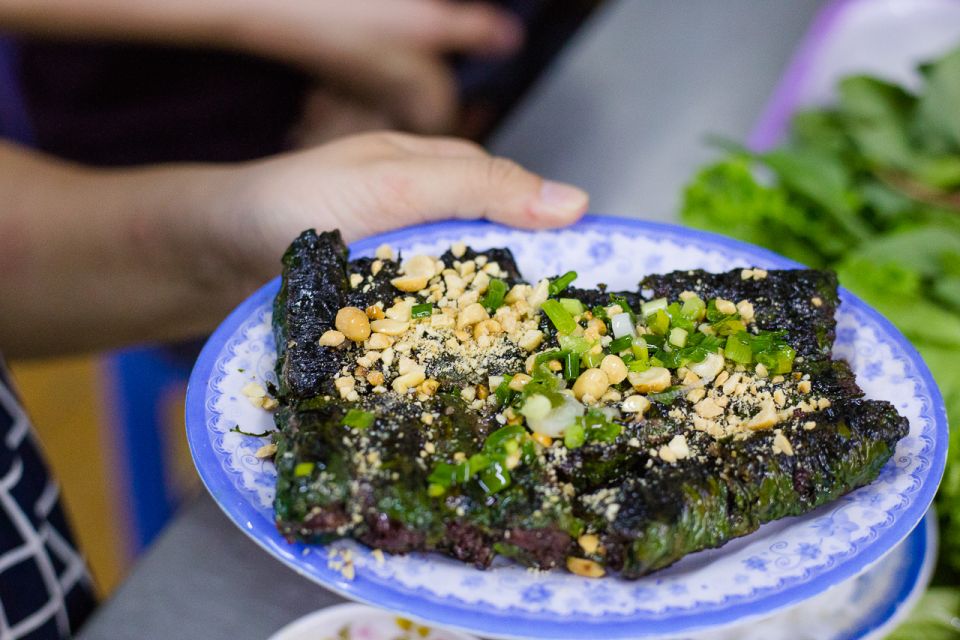 Ho Chi Minh City: Private Street Food Evening Walking Tour - From leaf-wrapped beef to pork noodle soup: the hearty middle stops