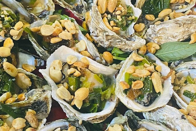 Ho Chi Minh City: Street Food & Sightseeing Tour with Local Guide - Stop 2: Ho Chi Minh City framing while you move