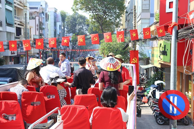 Ho Chi Minh City Tour and Independence Palace Ticket 2 in 1 - Riding the double-decker hop-on hop-off bus: views, landmarks, and pace
