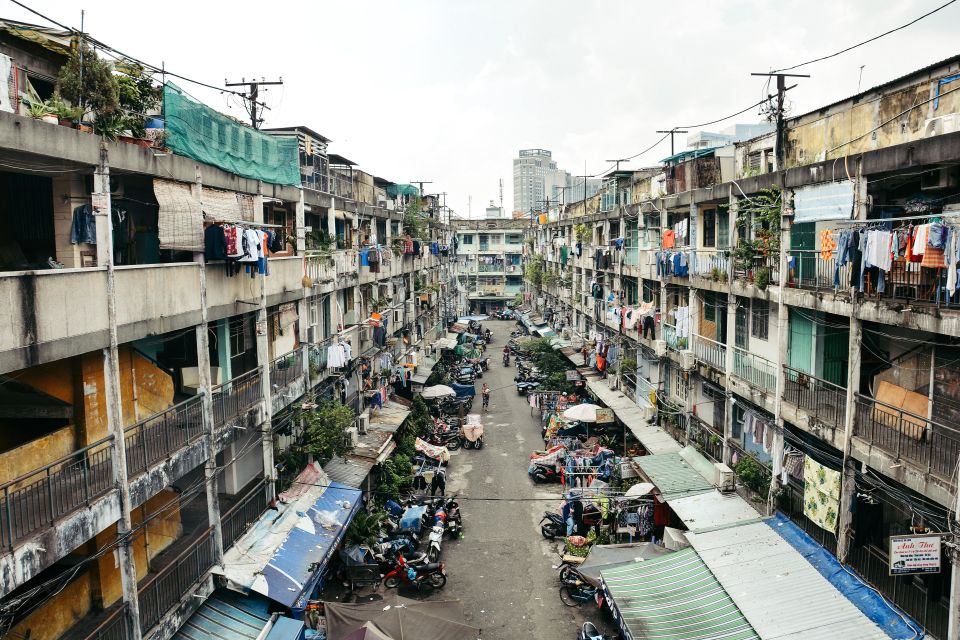 Ho Chi Minh: Historical City Scooter Tour - Pickup times, helmets, and staying comfortable on a scooter