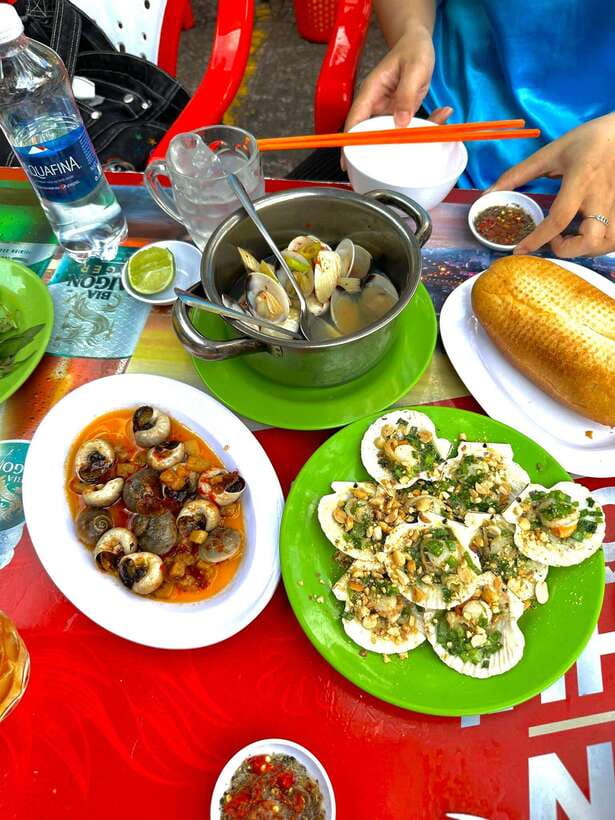 KISSTOUR | Motorbike Food Tour Female Drivers in Ho Chi Minh - Safety, Helmets, and Rain Ponchos That Actually Matter