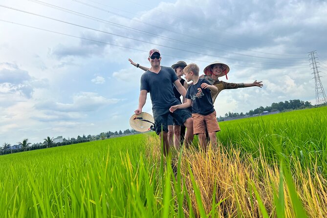 Mekong Day Trip Explore Village Bicycle CookingClass Group 12 Pax - My Tho and the Tien River boat ride: fresh air and traditional music