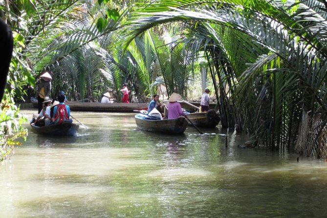Mekong Delta and Cu Chi Tunnels full day private tour - The Sampan Ride, Coconut Candy, and Village Roads
