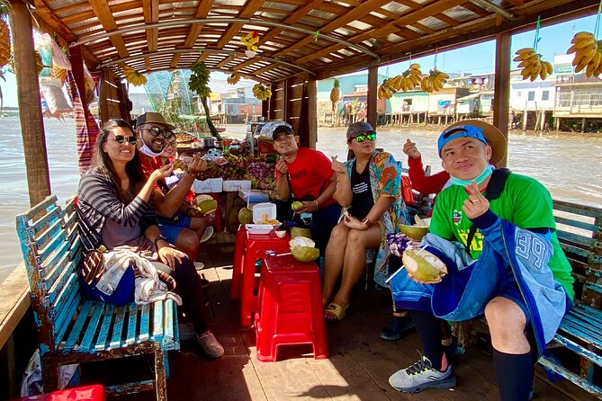MEKONG DELTA TOUR TO FLOATING MARKET CAI BE from HCM city - Stop 3: Sampan/Rowboat Canals Through Quiet Neighborhood Waterways