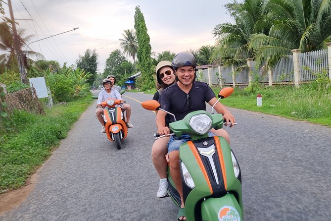 Mekong River Relaxing Sail boat cruise to Coconut Canals (1.5HRS) - Getting to the boat: motorbike and tuktuk pickup from Ben Tre