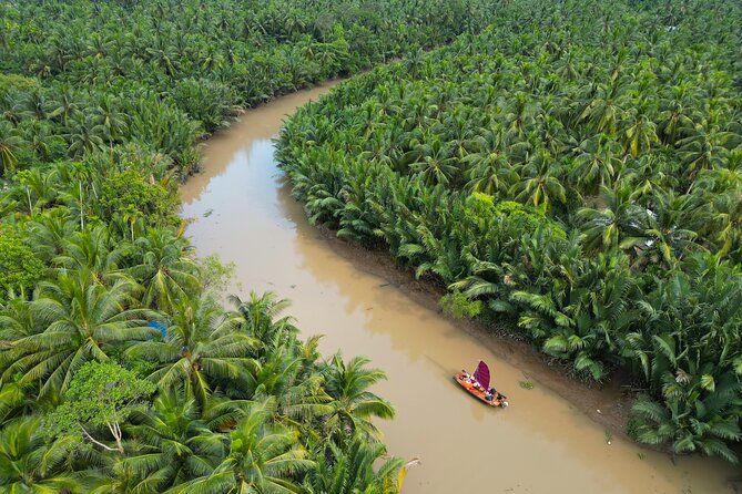 Mekong River Relaxing Sail boat cruise to Coconut Canals (1.5HRS) - Stop 1 Ben Tre: the quick ride and the warm start