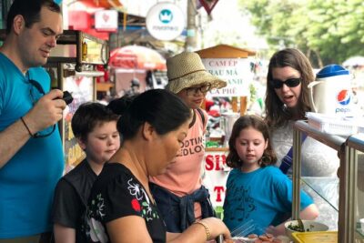 Morning Walking Food Tour in Non Tourist Area and Full of Local Life - Stop one: cooking Banh Cuon Trung and tasting pho chua dac biet