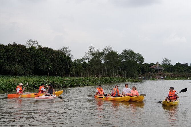 Off The Beaten Track The Mekong By Bike,boat & Kayak Day Trip - Kayaking and small-channel time: paddling with life vests and support