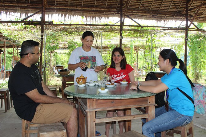 Private Cu Chi Tunnels and Mekong Delta full day - Lunch at Riverside plus included bottled water and war-themed snacks