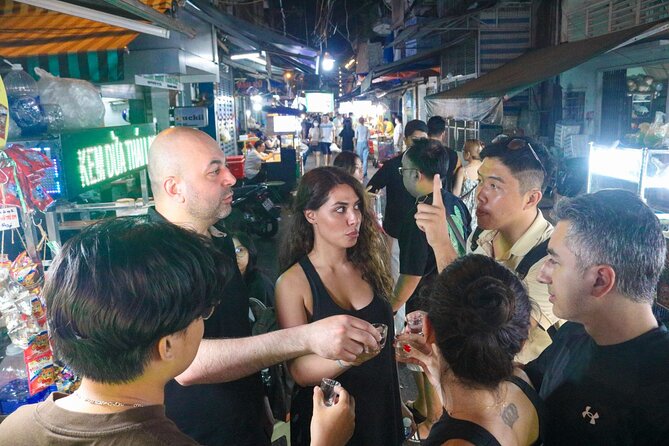 Private Discover Saigon Hidden Spots on Night Motorbike Adventure - Cross Flower Market in District 10: where colors slow you down