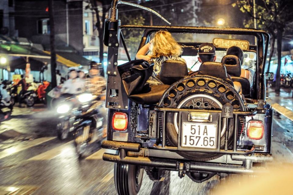Private Jeep Tour Saigon by Night & Cruise Dinner with Music - The river dinner cruise: views, timing, and music by Duc Dau