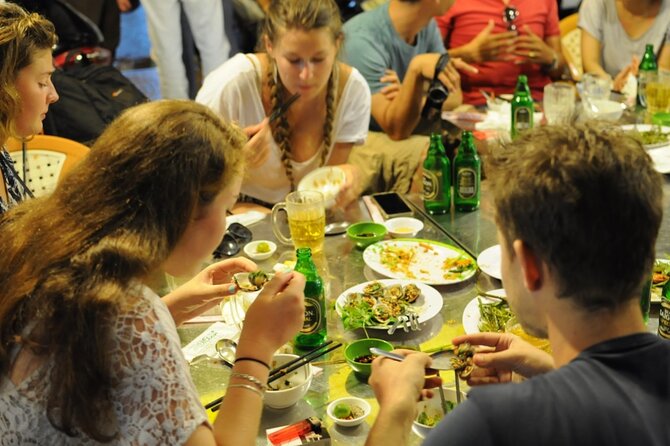 Private Jeep Tour Saigon by Night: Foodie & City Tour - Dinner at two restaurants plus a skybar drink: the foodie angle
