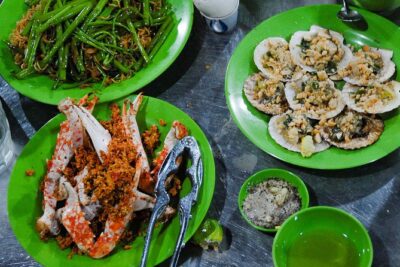 Private Street Food Motorbike Tour in Ho Chi Minh City - What you get for your money: pickup, helmets, and all the practical extras