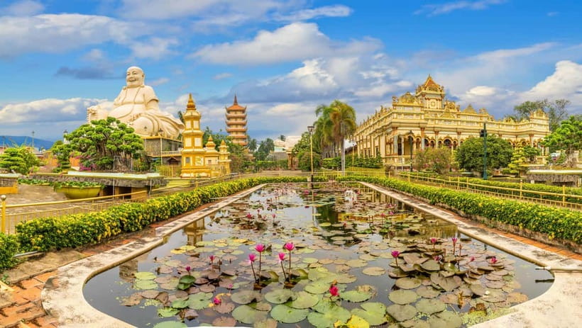 Private Vinh Trang Pagoda & Mekong Delta from Ho Chi Minh - Sampan through coconut canals: the slow boat that changes the whole feel