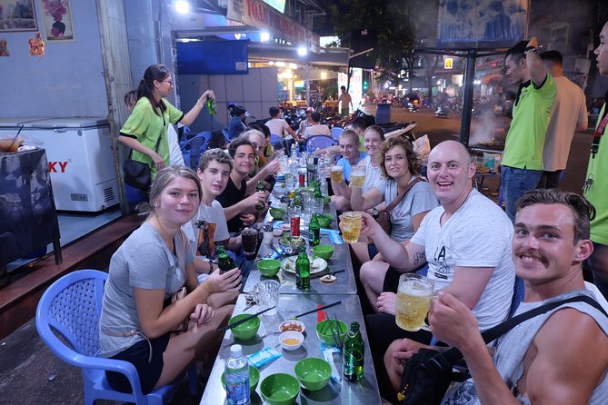 Saigon After Dark and Street Food by Motorbike and Scooter - Nguyen Trai Street at Night: Fashion Shops and People-Watching Energy