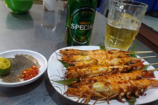 Saigon After Dark and Street Food by Motorbike and Scooter - District 4 Food Paradise Energy: Immigrant Roots and a Small-Island Feel