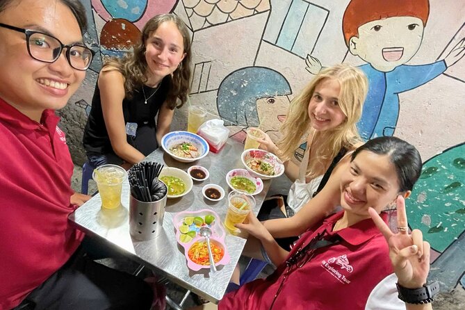 Saigon By Night: Authentic Street Food Scooter Adventure - Chợ Lớn and Ho Thi Ky Flower Market: food meets neighborhood life