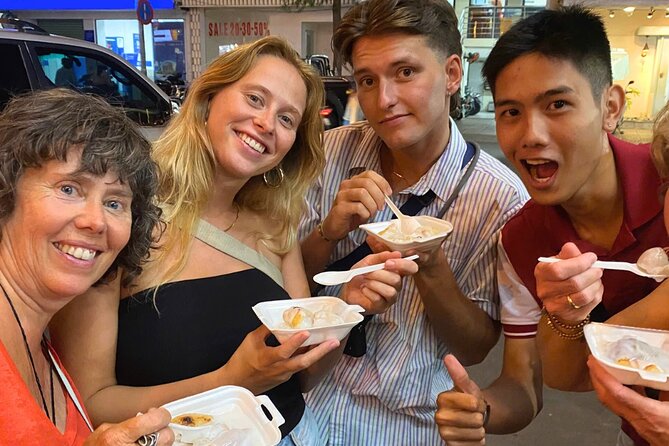 Saigon By Night: Authentic Street Food Scooter Adventure - Apartment-building views and District 3 calm: a quick reset between meals