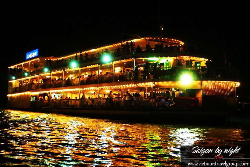 Saigon by Night: Traditional Dinner Cruise - District 1 pickup and the cyclo loop: Ben Thanh, City Hall, and real traffic