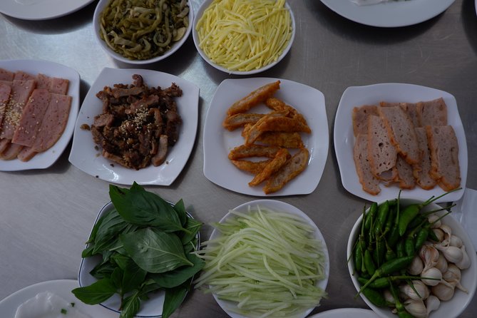 Saigon luxury food tour on motorbike with 10 authentic dishes - Ho Thi Ky Flower Market stop: a local landmark before you eat