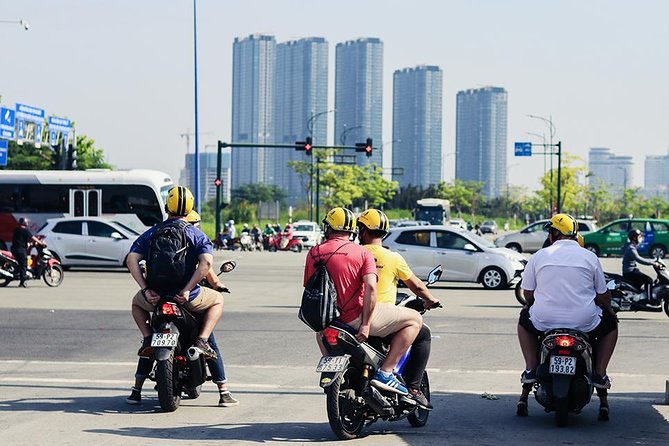 Saigon Morning Tour on Scooter Including Street Food - Riding Saigon as a Passenger: Traffic Skills, Landmark Stops, and Real Views