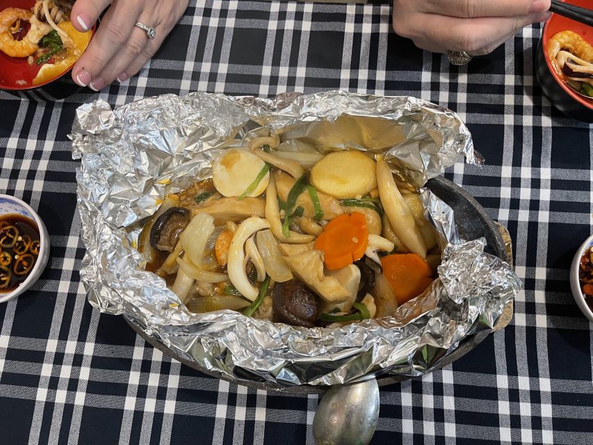 Saigon: Night Craft Beer And Street Food Tour By Vespa - The Biggest Flower Market and Grilled Rice Paper With Toppings