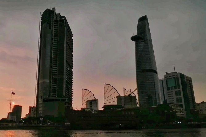 Sunset City-Dragon Floating Temple on River with LUXURY SPEEDBOAT - Leaving Bach Dang Pier: bridges, skyline, and big-city river views