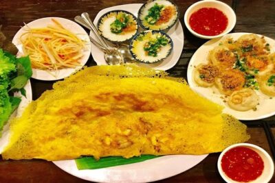 Taste the Unreal Street Food Walking Tour in Saigon - Hotel pickup and the smart start in District 3