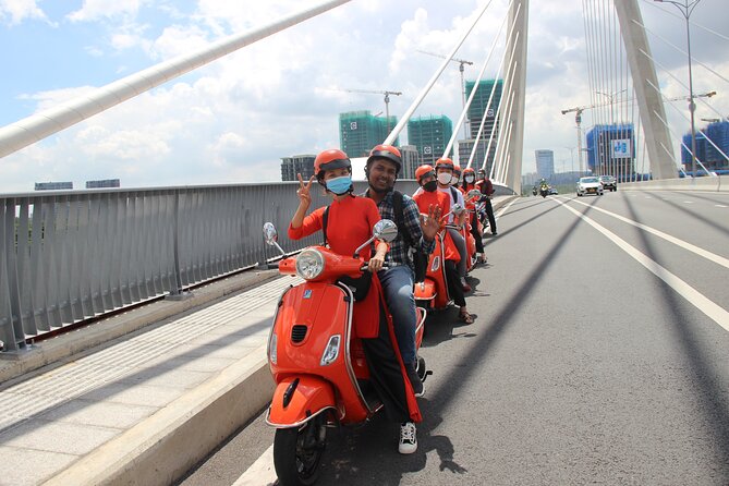 The Insider's Saigon With Female Ao Dai Riders Vespa 4,5 Hours - Central Post Office, Notre Dame, and the “grand Saigon” first look