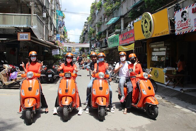 The Insider's Saigon With Female Ao Dai Riders Vespa 4,5 Hours - Ho Thi Ky flower market: color, motion, and local commerce