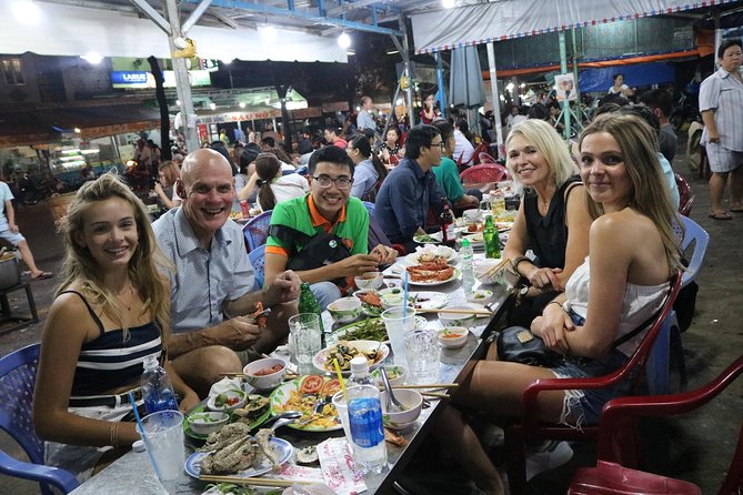 Vespa Saigon By Night Street Food Tour - The first dinner stop: bánh xèo, spring rolls, and local street comfort