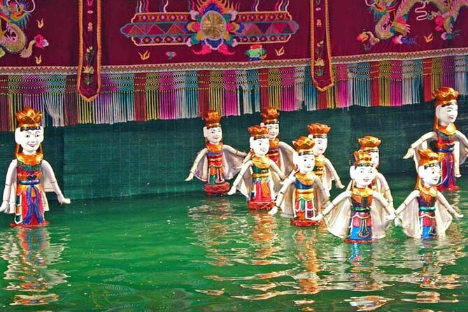 Water Puppet Show Plus Sightseeing By Cyclo and Saigon Dinner Cruise - Cu Chi Tunnels and War Remnants Museum: big lessons, tight time